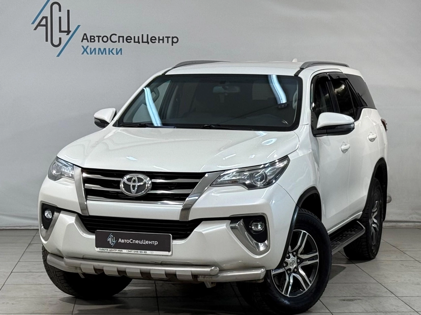 Автомобиль Toyota Fortuner II поколение 2.8d AT 4WD (177 л.с.) Элеганс Белый 2018 с пробегом 203 500 км