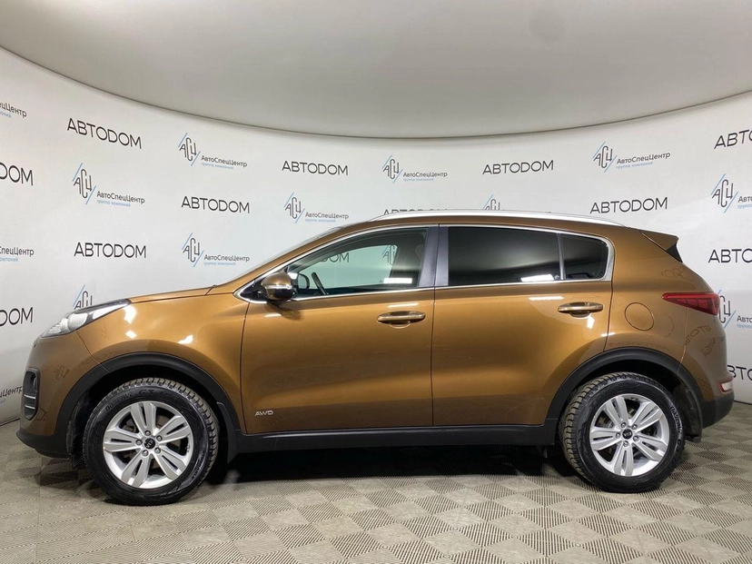 Автомобиль Kia Sportage IV поколение 2.0 MT 4WD (150 л.с.) Luxe Коричневый 2017 с пробегом 125 092 км