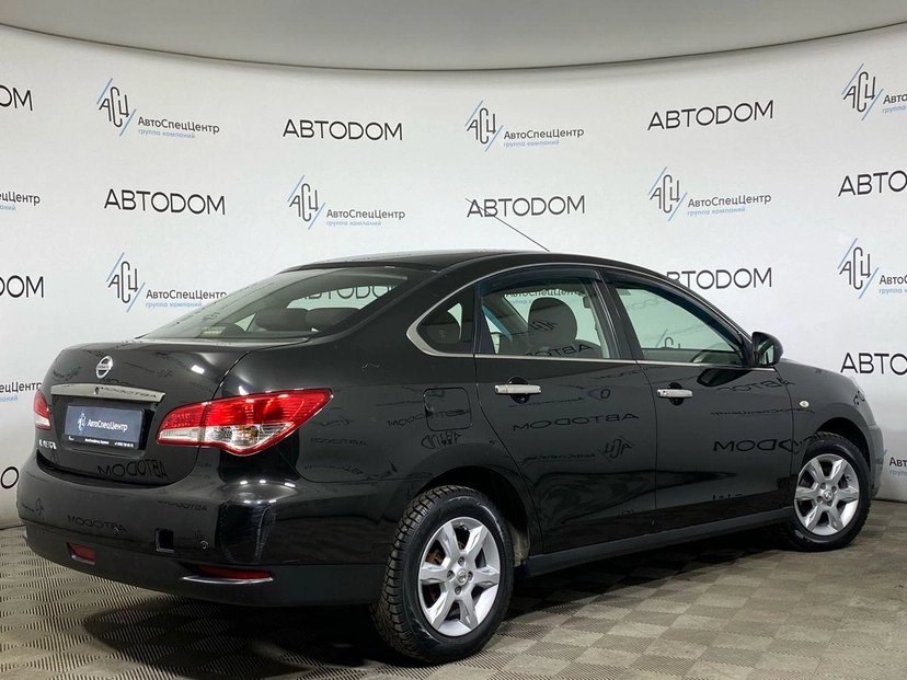 Автомобиль Nissan Almera III поколение (G15) 1.6 MT (102 л.с.) Comfort A/C Чёрный 2016 с пробегом 142 360 км