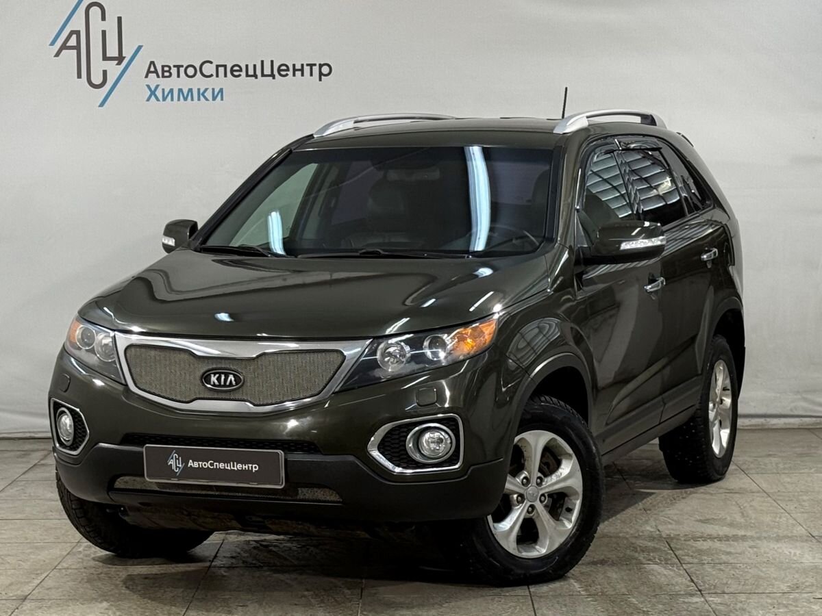 Автомобиль Kia Sorento II поколение 2.2d AT 4WD (197 л.с.) Prestige Зелёный 2010 с пробегом 275 000 км