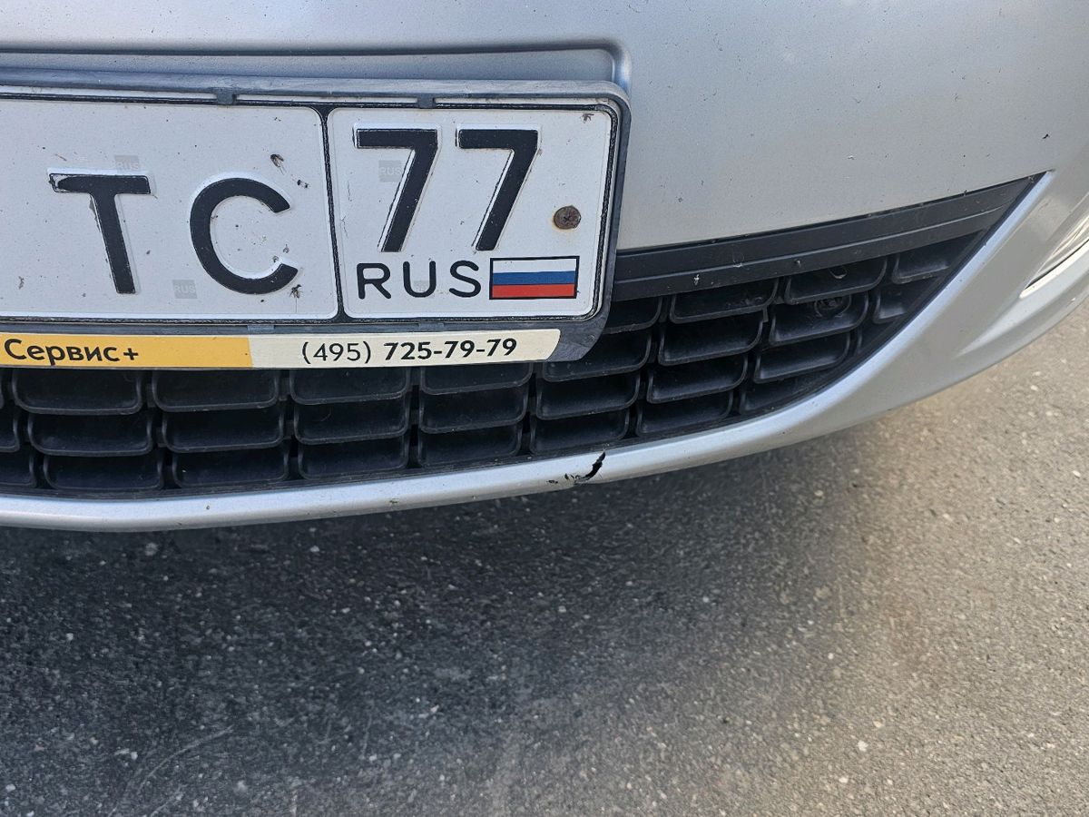 Opel Astra IV поколение (J) 1.6 AT (115 л.с.) Cosmo Серебристый 2012 с пробегом 118 830 км
