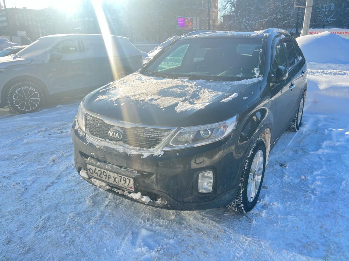Автомобиль Kia Sorento II [рестайлинг] 2.4 AT 4WD (175 л.с.) New Prestige (2015) Чёрный 2015 с пробегом 187 273 км