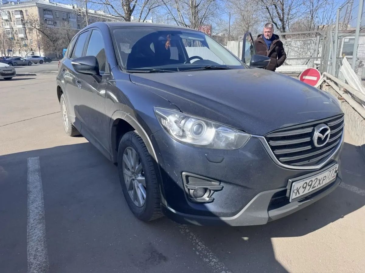 Автомобиль Mazda CX-5 I [рестайлинг] 2.0 AT 4WD (150 л.с.) Active Синий 2017 с пробегом 255 777 км