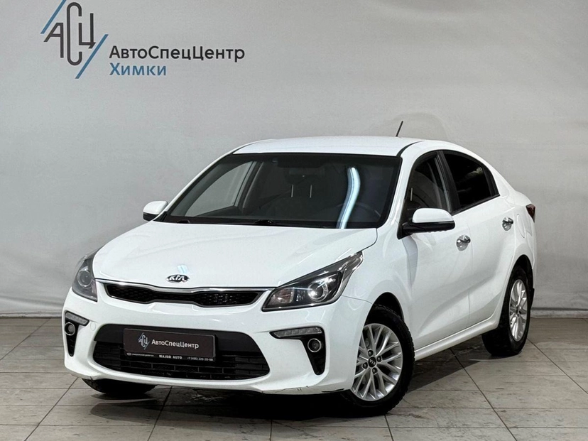 Автомобиль Kia Rio IV поколение 1.6 AT (123 л.с.) Luxe Белый 2020 с пробегом 140 000 км