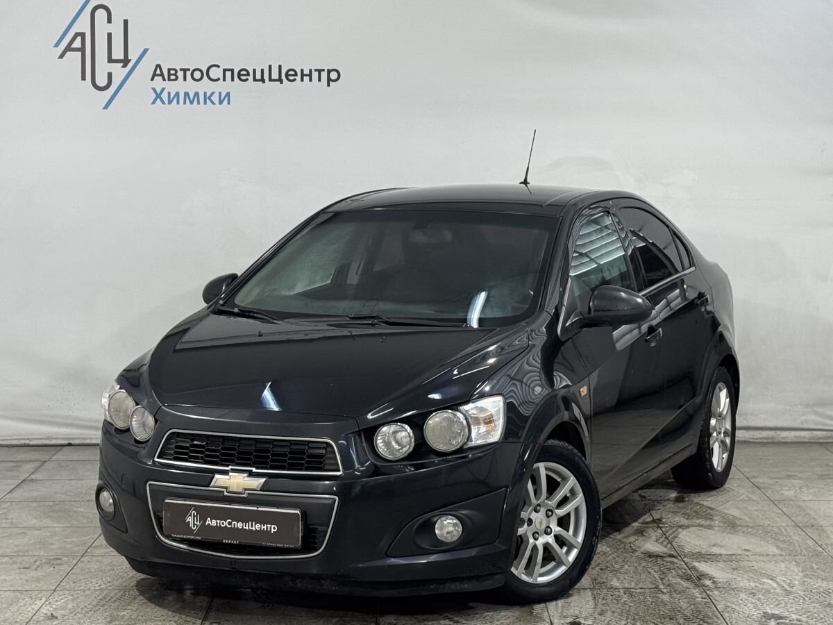 Автомобиль Chevrolet Aveo II поколение (T300) 1.6 AT (115 л.с.) LT Чёрный 2014 с пробегом 145 000 км