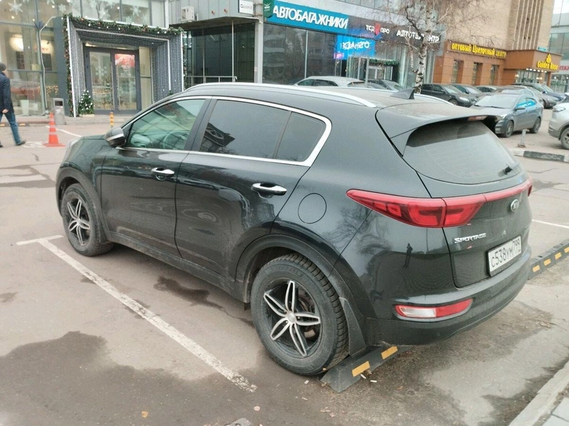 Автомобиль Kia Sportage IV поколение 2.0 AT (150 л.с.) Luxe Чёрный 2017 с пробегом 101 891 км