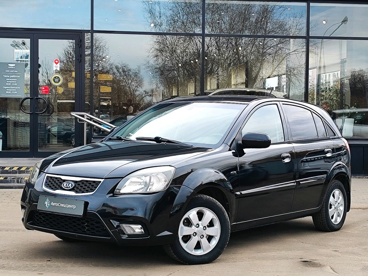 Kia Rio II [рестайлинг] 1.4 AT (95 л.с.) Prestige Чёрный 2011 с пробегом 91 543 км