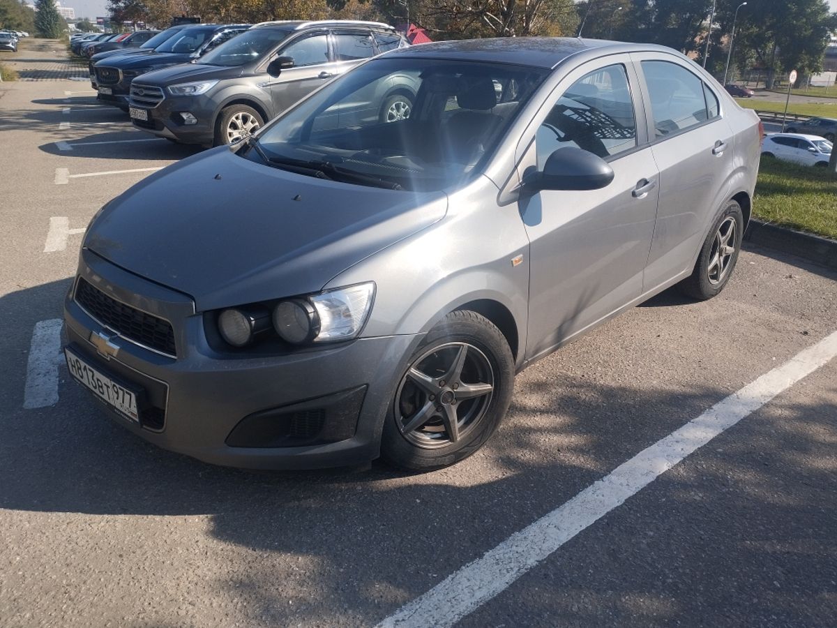 Chevrolet Aveo II поколение (T300) 1.6 AT (115 л.с.) LT Серый 2013 с пробегом 130 394 км