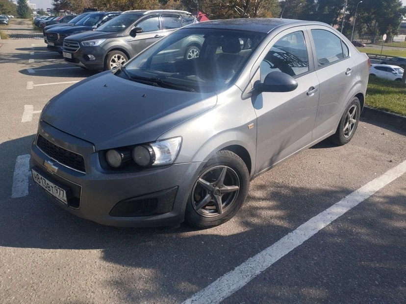 Chevrolet Aveo II поколение (T300) 1.6 AT (115 л.с.) LT Серый 2013 с пробегом 130 394 км