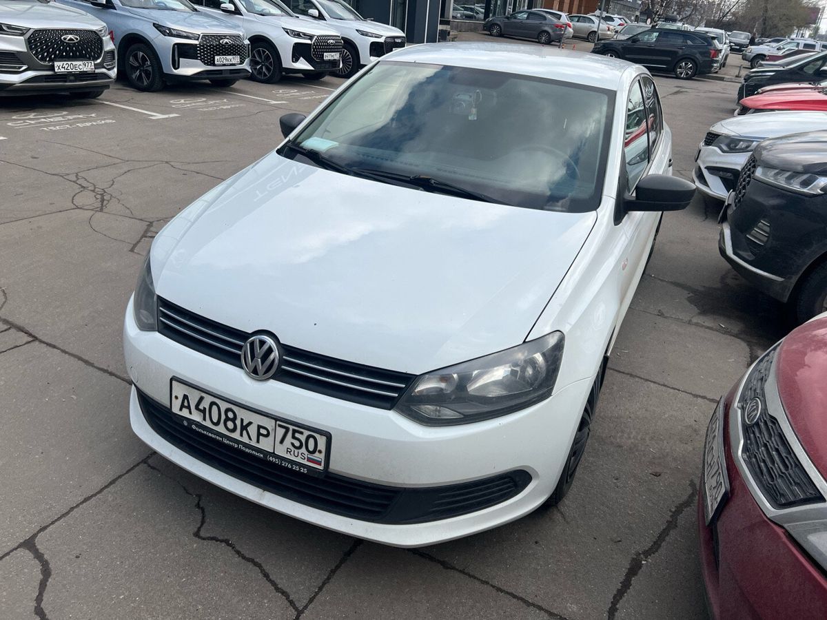Автомобиль Volkswagen Polo V поколение 1.6 MT (105 л.с.) Trendline Белый 2014 с пробегом 207 200 км