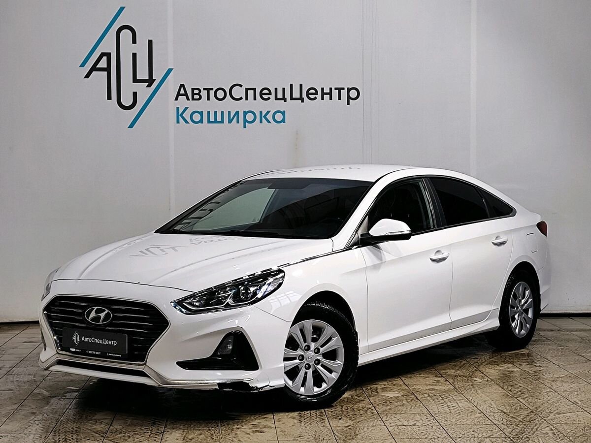 Автомобиль Hyundai Sonata VII (LF) [рестайлинг] 2.0 AT (150 л.с.) Comfort Белый 2017 с пробегом 151 643 км