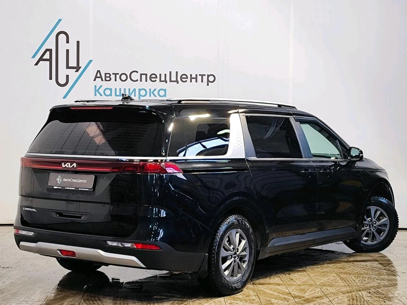 Автомобиль Kia Carnival IV поколение 2.2d AT (199 л.с.) Luxe (2021) Чёрный 2021 с пробегом 174 808 км