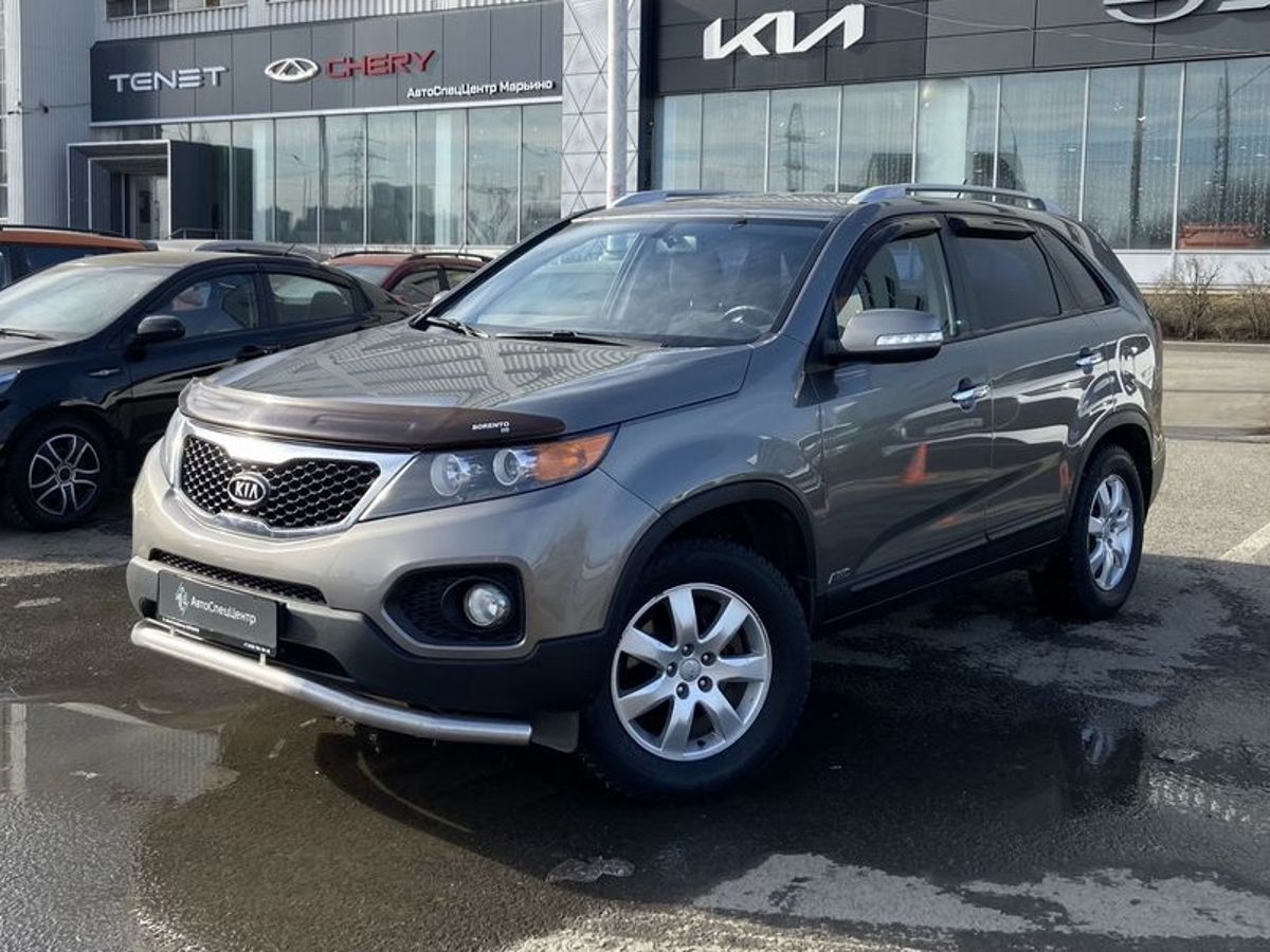 Автомобиль Kia Sorento II [рестайлинг] 2.4 AT 4WD (175 л.с.) Comfort Серый 2012 с пробегом 140 000 км