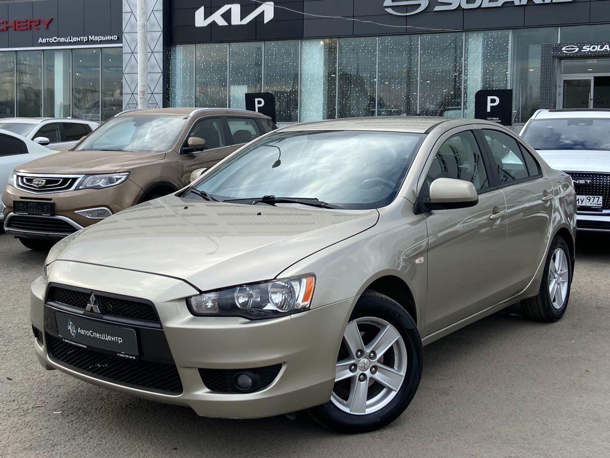 Автомобиль Mitsubishi Lancer X поколение 1.8 CVT (143 л.с.) Base Бежевый 2008 с пробегом 85 577 км