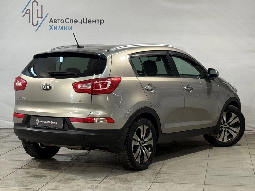 Автомобиль Kia Sportage III поколение 2.0 AT 4WD (150 л.с.) Prestige Чёрный 2013 с пробегом 141 000 км