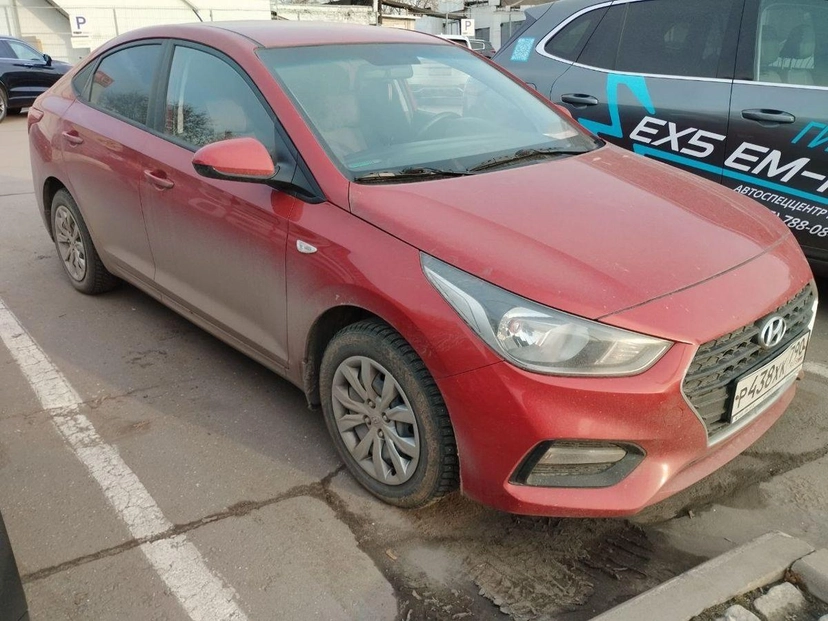 Автомобиль Hyundai Solaris II поколение 1.6 AT (123 л.с.) Comfort Красный 2018 с пробегом 131 452 км