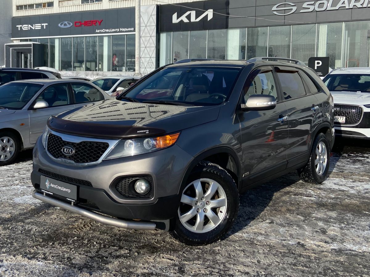 Автомобиль Kia Sorento II [рестайлинг] 2.4 AT 4WD (175 л.с.) Comfort Серый 2012 с пробегом 140 000 км