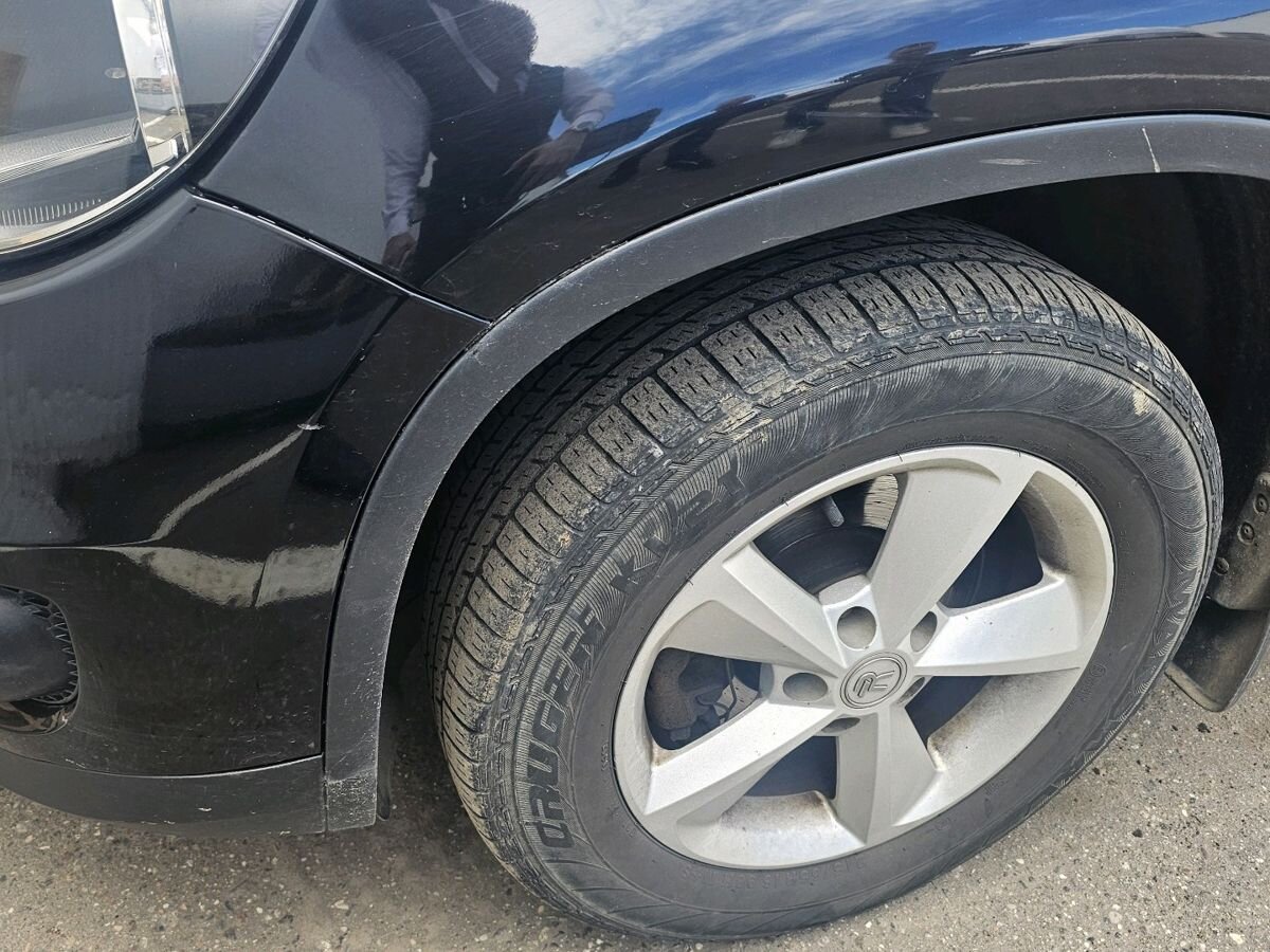 Volkswagen Tiguan I [рестайлинг] 1.4 AMT (150 л.с.) Avenue Чёрный 2012 с пробегом 141 981 км