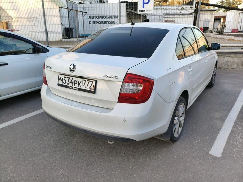 Skoda Rapid I поколение 1.6 AT (110 л.с.) Ambition Белый 2015 с пробегом 130 932 км