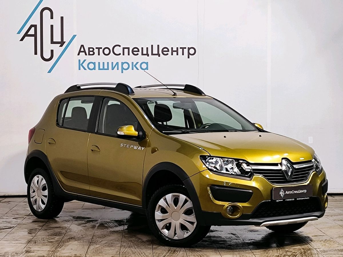 Автомобиль Renault Sandero II поколение 1.6 MT (102 л.с.) Base Золотой 2016 с пробегом 118 758 км