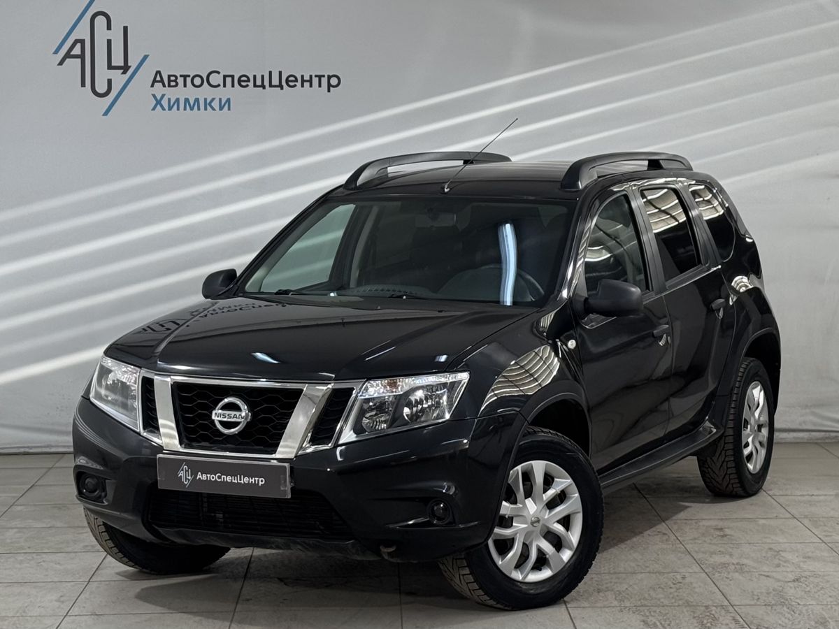 Автомобиль Nissan Terrano III поколение (D10) 2.0 AT (135 л.с.) Base Чёрный 2014 с пробегом 148 000 км