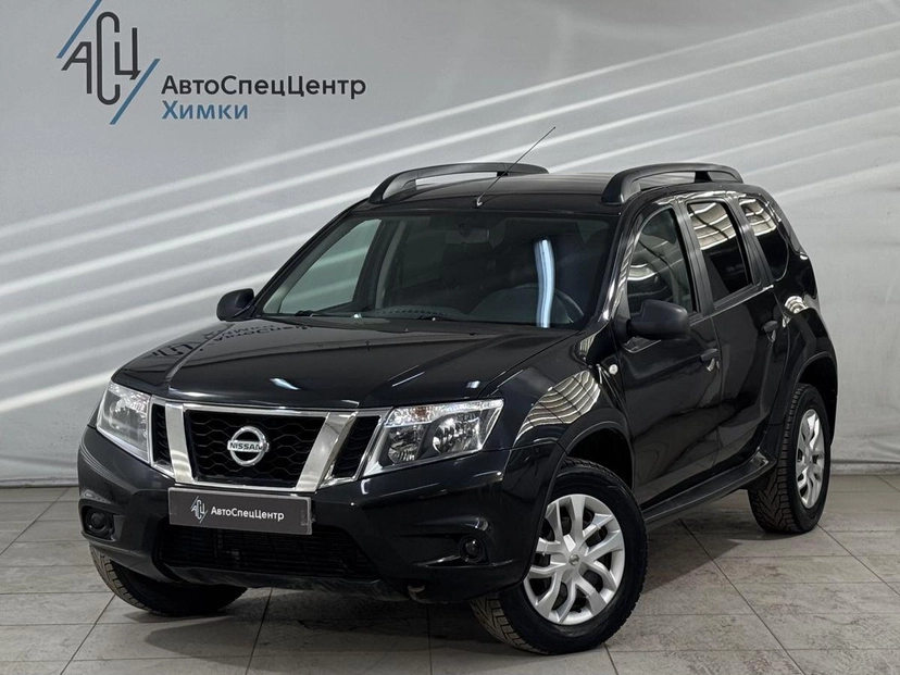 Автомобиль Nissan Terrano III поколение (D10) 2.0 AT (135 л.с.) Base Чёрный 2014 с пробегом 148 000 км