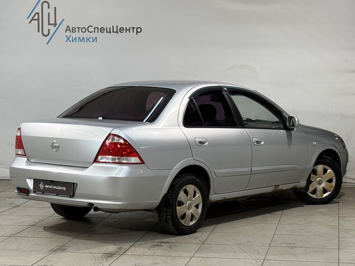 Автомобиль Nissan Almera Classic I поколение (B10) 1.6 MT (107 л.с.) Base Серебристый 2011 с пробегом 194 000 км