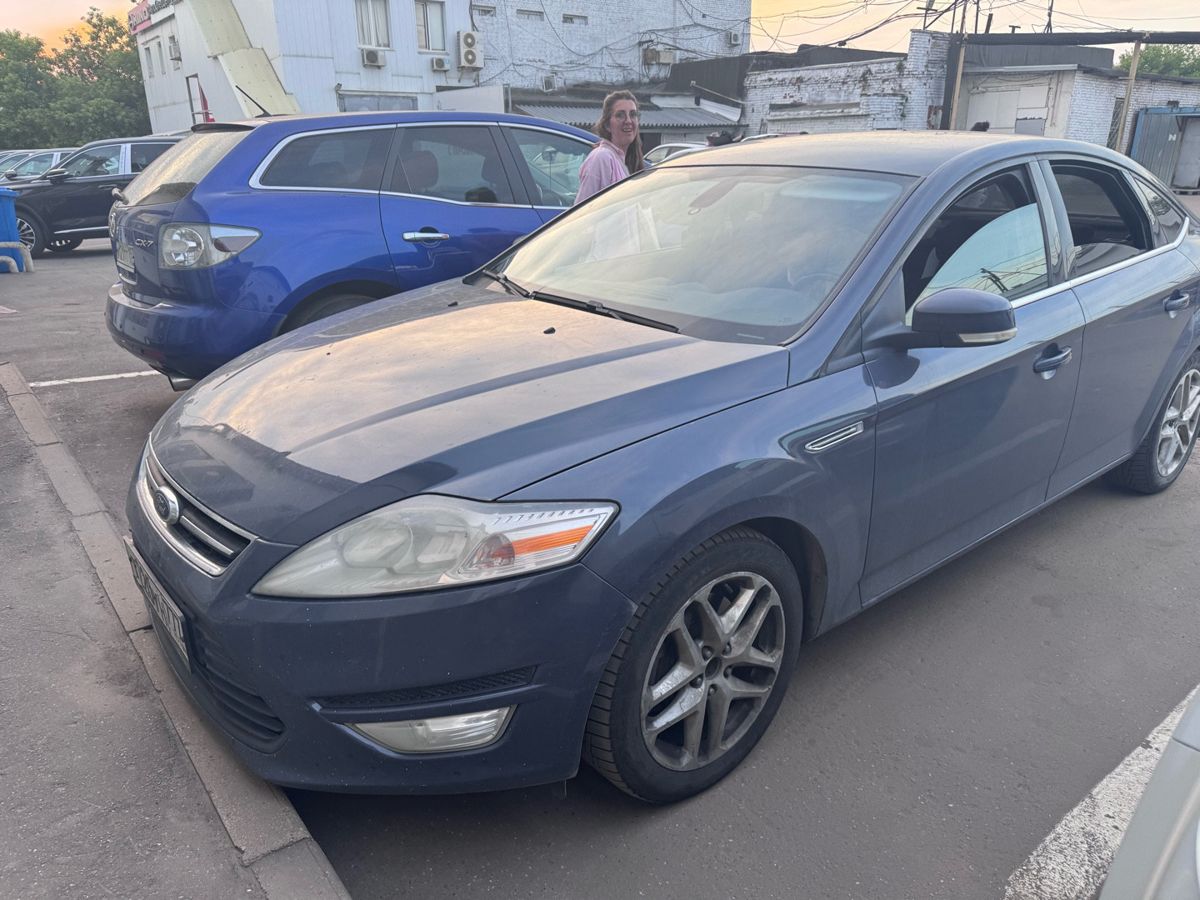 Ford Mondeo IV [рестайлинг] 2.3 AT (161 л.с.) Ghia Серый 2011 с пробегом 276 671 км