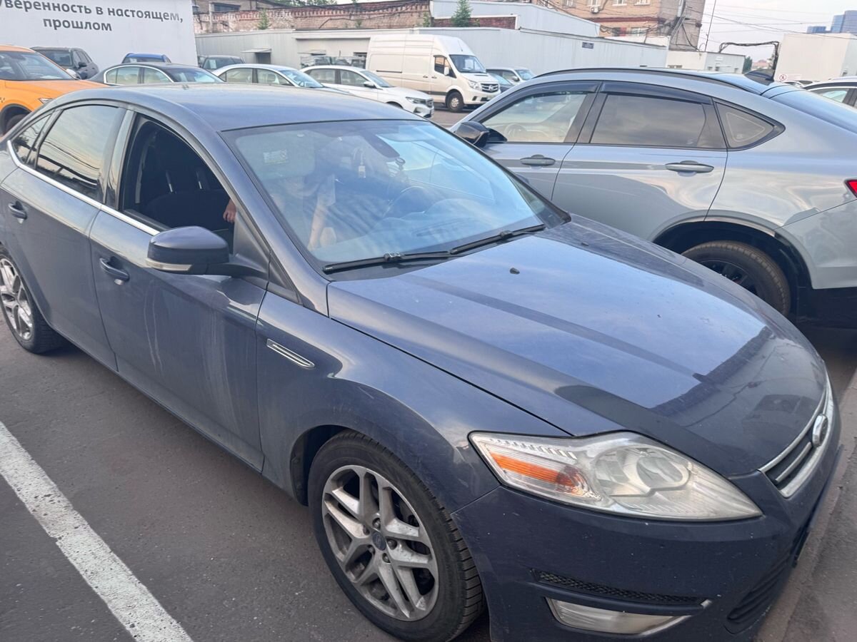 Ford Mondeo IV [рестайлинг] 2.3 AT (161 л.с.) Ghia Серый 2011 с пробегом 276 671 км