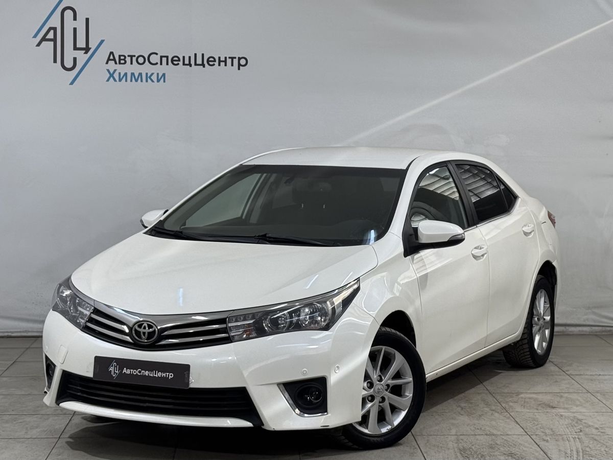 Автомобиль Toyota Corolla XI (E160/E170) 1.6 CVT (122 л.с.) Стиль Плюс Белый 2013 с пробегом 167 000 км