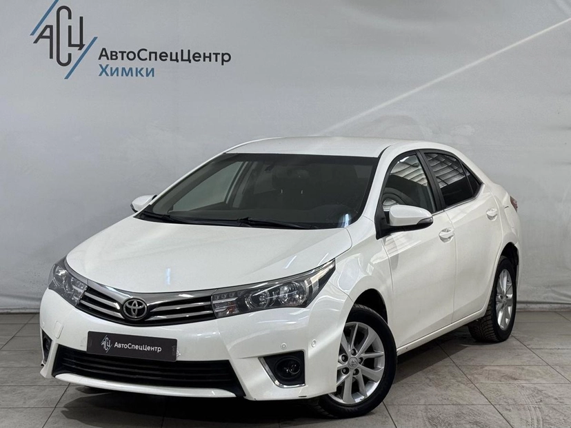 Автомобиль Toyota Corolla XI (E160/E170) 1.6 CVT (122 л.с.) Стиль Плюс Белый 2013 с пробегом 167 000 км
