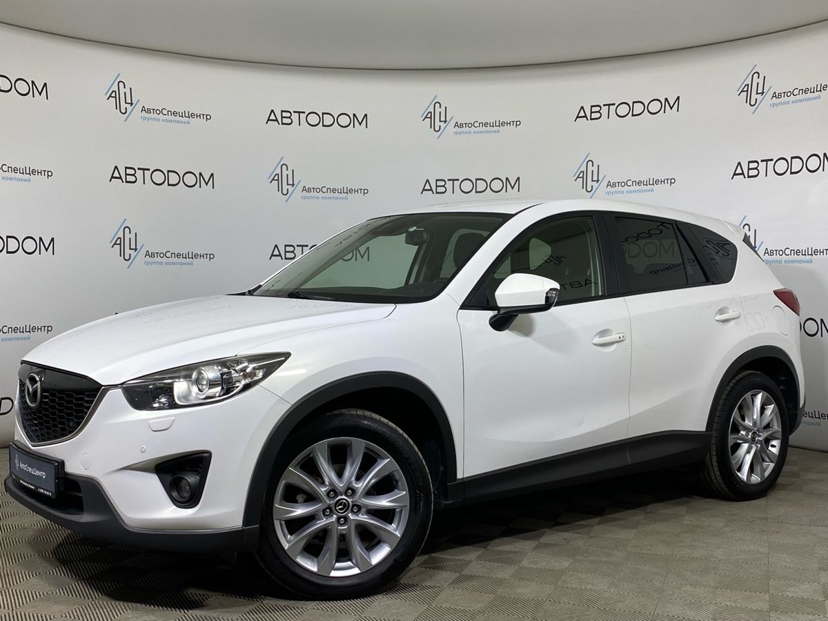 Mazda CX-5 I поколение 2.0 AT 4WD (150 л.с.) Supreme Белый 2014 с пробегом 135 271 км