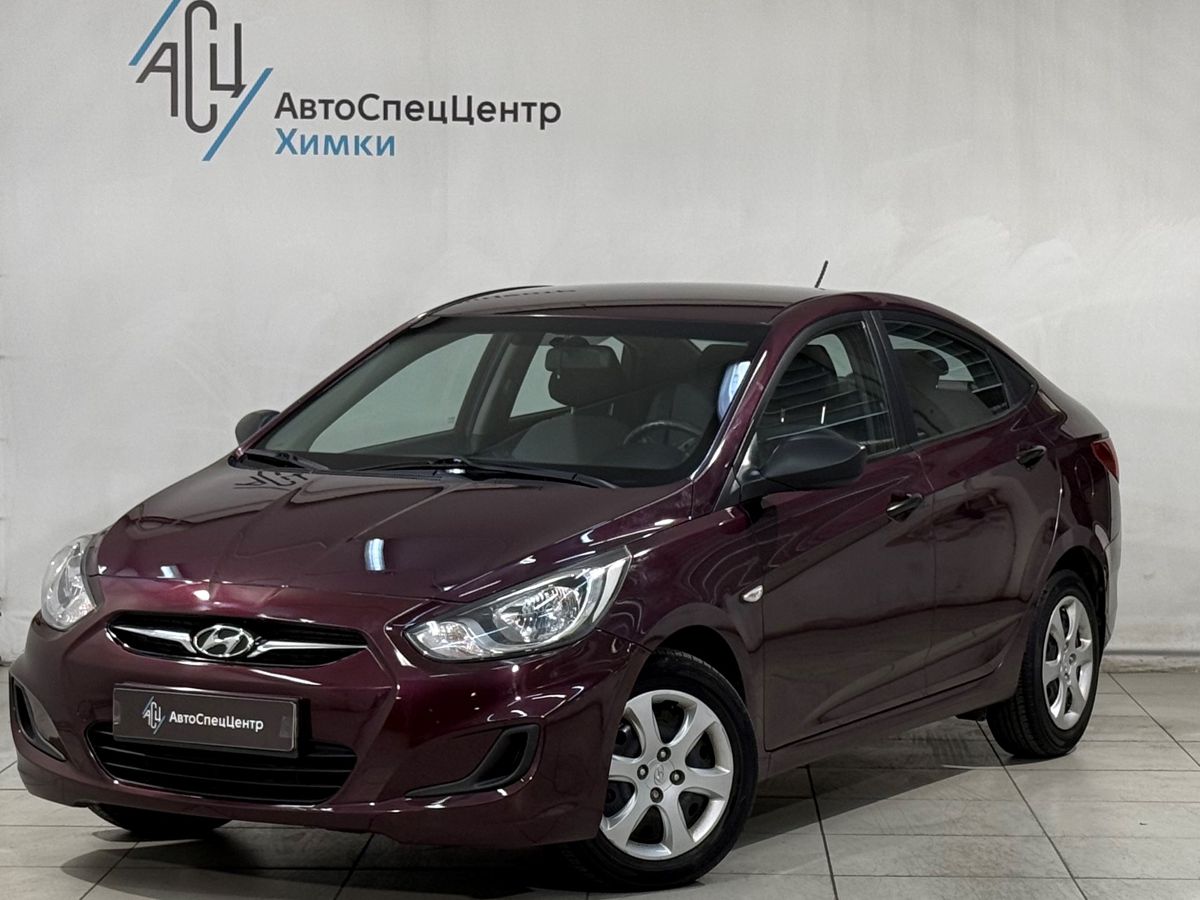 Hyundai Solaris I поколение 1.4 AT (107 л.с.) Optima Фиолетовый 2014 с пробегом 70 000 км
