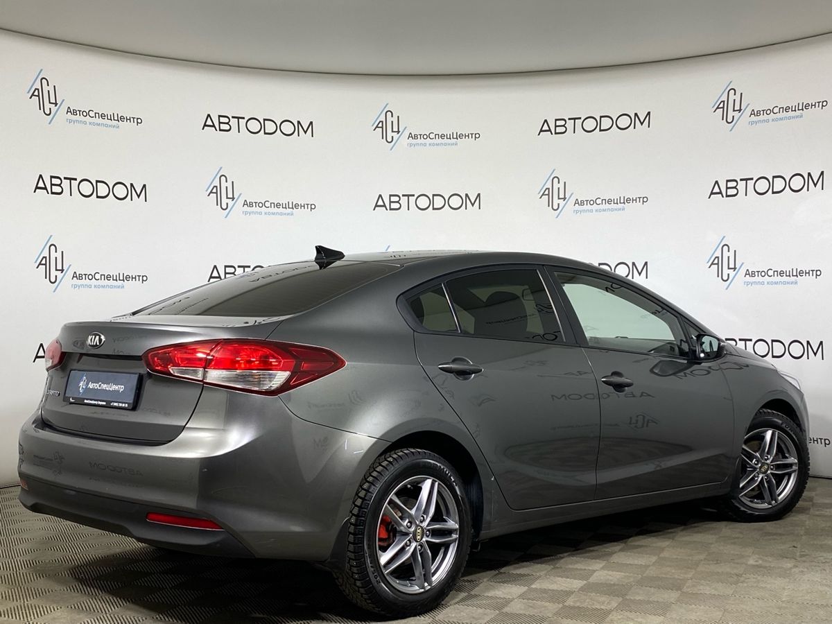 Автомобиль Kia Cerato III [рестайлинг] (Classic) 1.6 AT (130 л.с.) Luxe 2016 Серый 2017 с пробегом 152 000 км