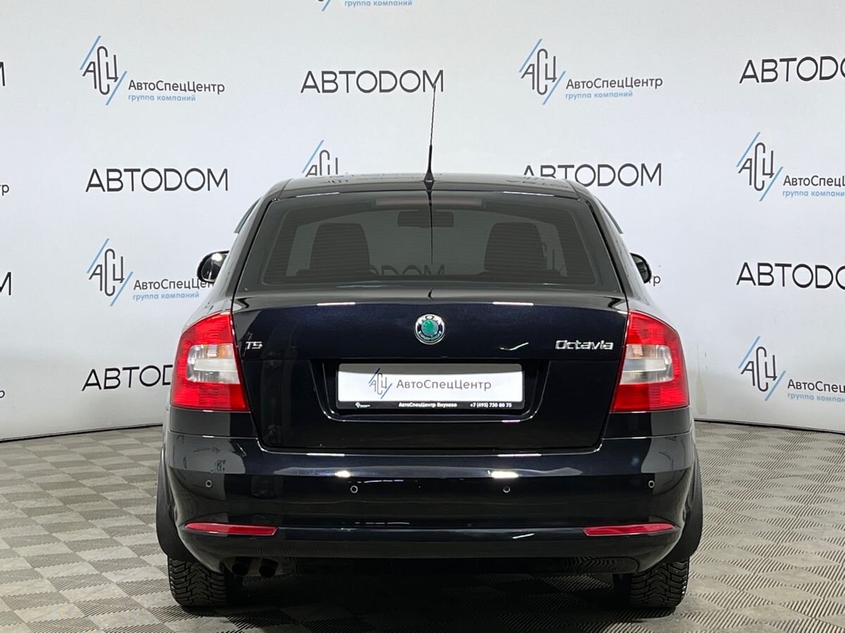 Автомобиль Skoda Octavia II (A5) [рестайлинг] 1.4 MT (122 л.с.) Ambition Чёрный 2012 с пробегом 166 221 км