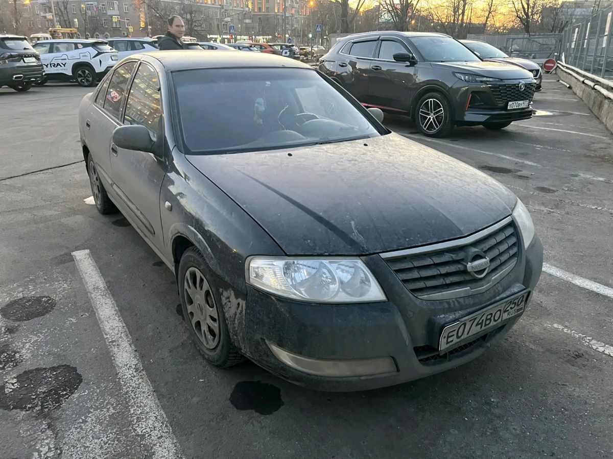 Автомобиль Nissan Almera Classic I поколение (B10) 1.6 AT (107 л.с.) Base Чёрный 2009 с пробегом 241 083 км
