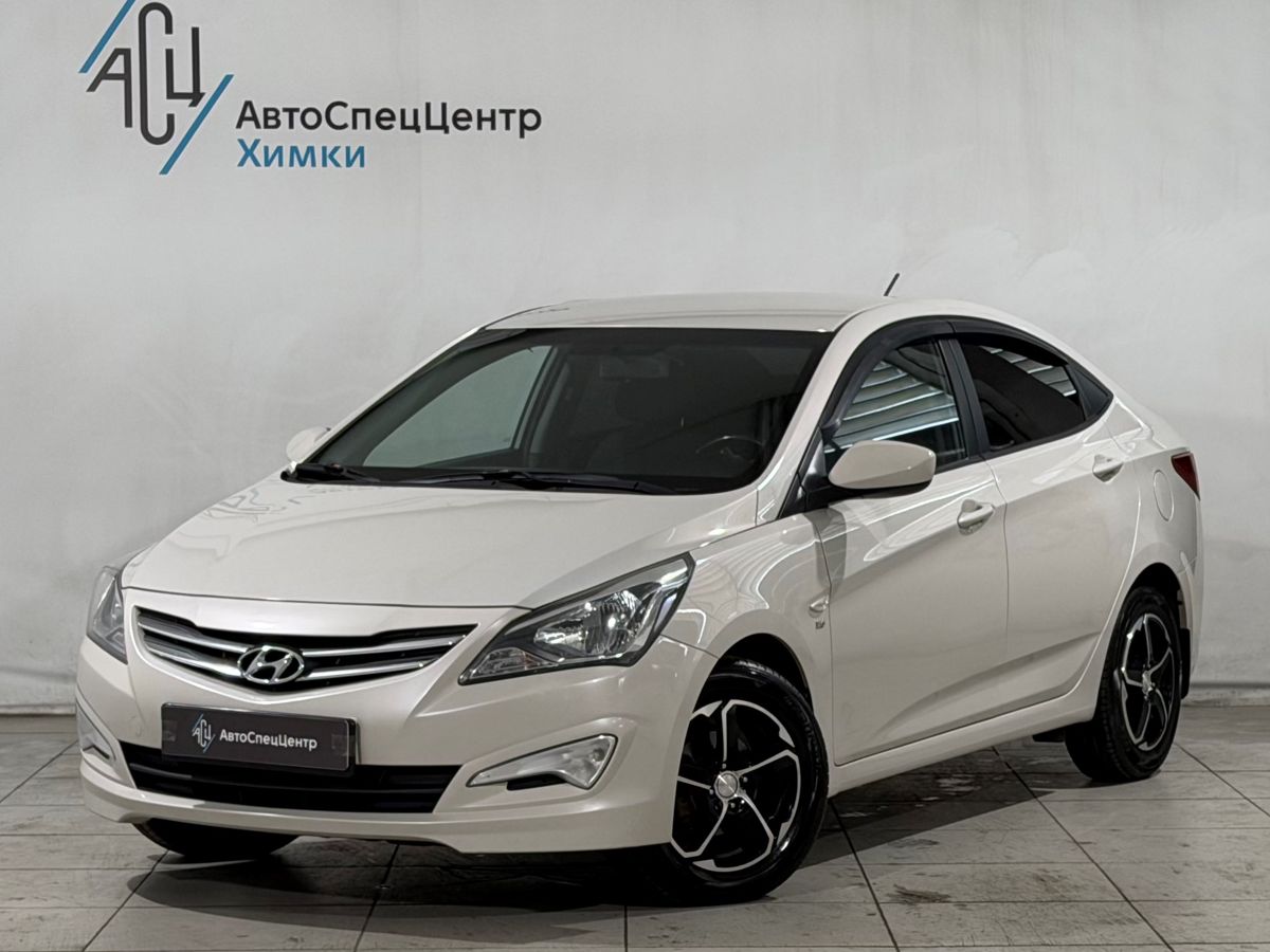 Hyundai Solaris I [рестайлинг] 1.6 AT (123 л.с.) Elegance Бежевый 2015 с пробегом 150 000 км