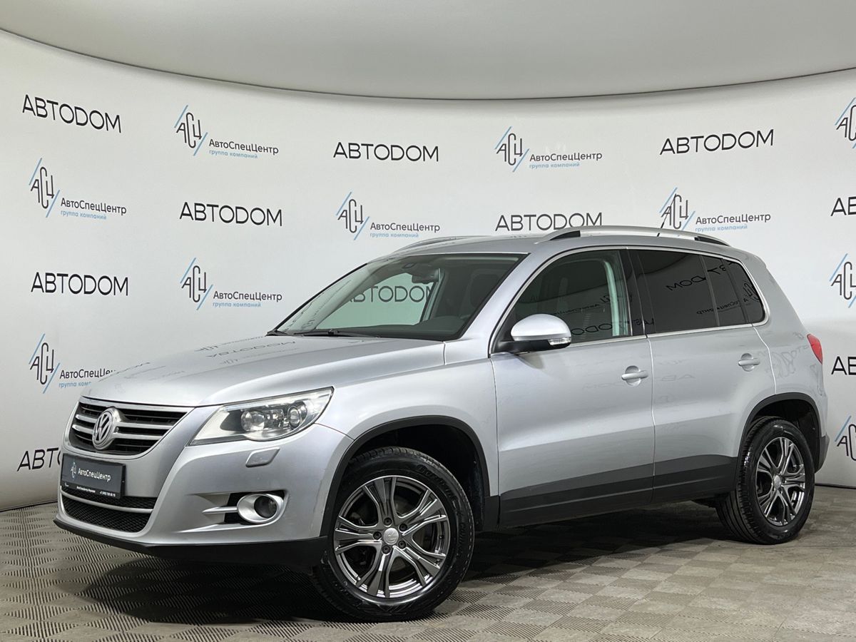 Volkswagen Tiguan I поколение 2.0 AT 4WD (170 л.с.) Sport & Style Серебристый 2011 с пробегом 243 390 км