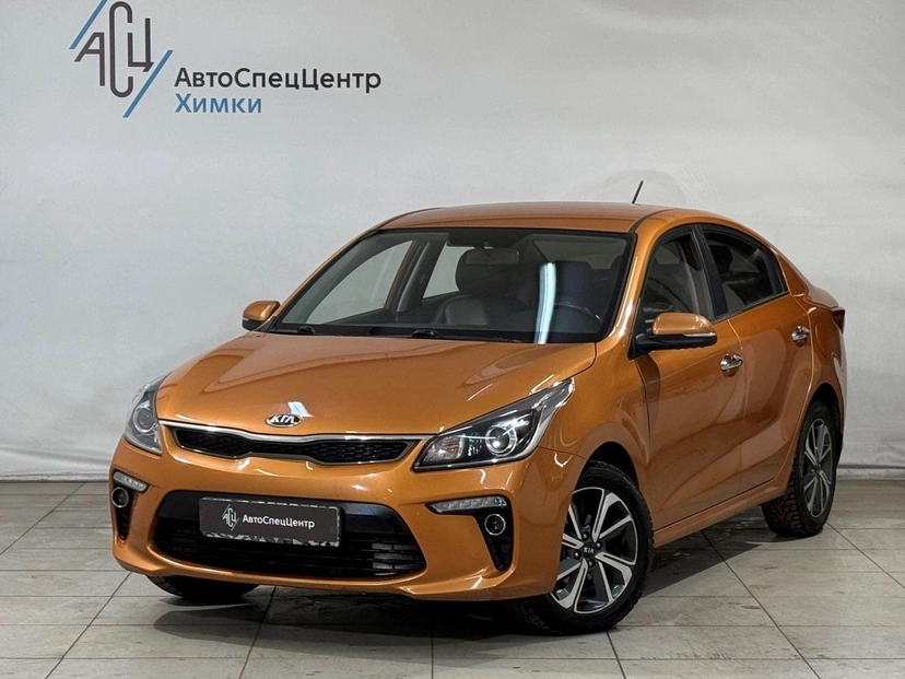 Автомобиль Kia Rio IV поколение 1.6 AT (123 л.с.) Premium Оранжевый 2019 с пробегом 60 000 км