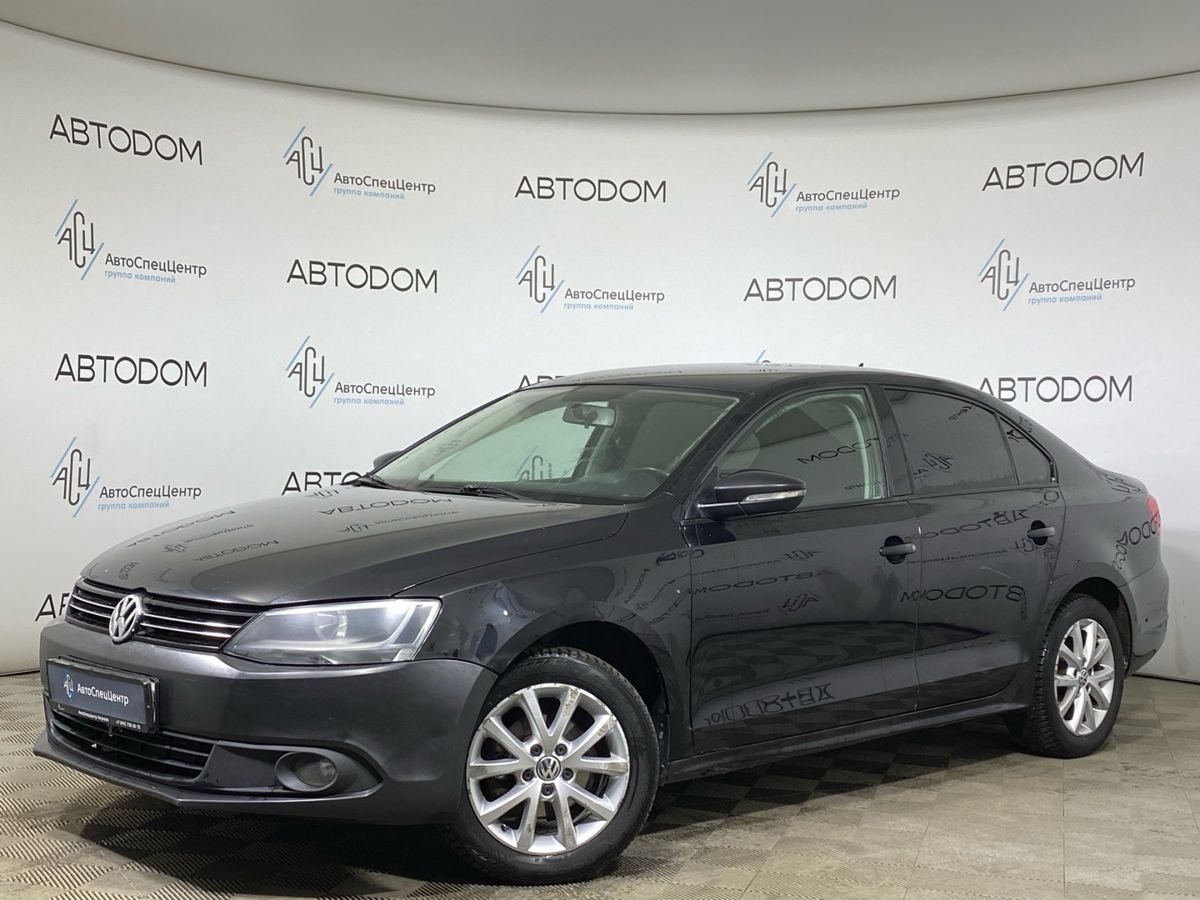 Автомобиль Volkswagen Jetta VI поколение 1.6 AT (105 л.с.) Style Чёрный 2013 с пробегом 206 326 км