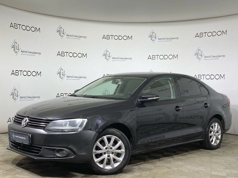 Автомобиль Volkswagen Jetta VI поколение 1.6 AT (105 л.с.) Style Чёрный 2013 с пробегом 206 326 км