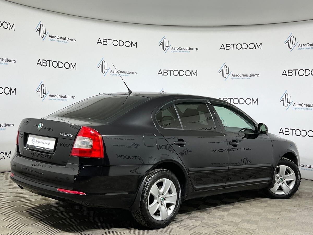 Автомобиль Skoda Octavia II (A5) [рестайлинг] 1.4 MT (122 л.с.) Ambition Чёрный 2012 с пробегом 166 221 км