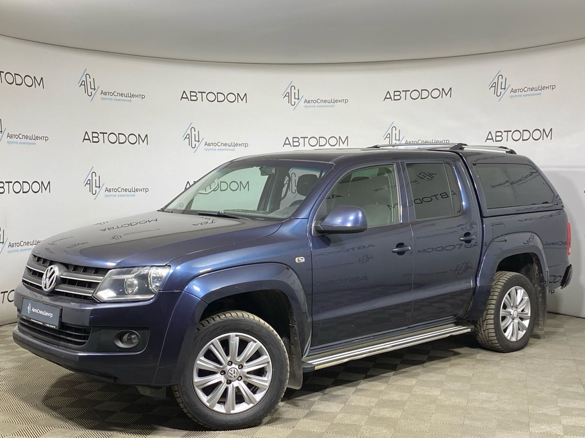 Автомобиль Volkswagen Amarok I поколение 2.0d MT 4WD (140 л.с.) Trendline Синий 2013 с пробегом 166 284 км