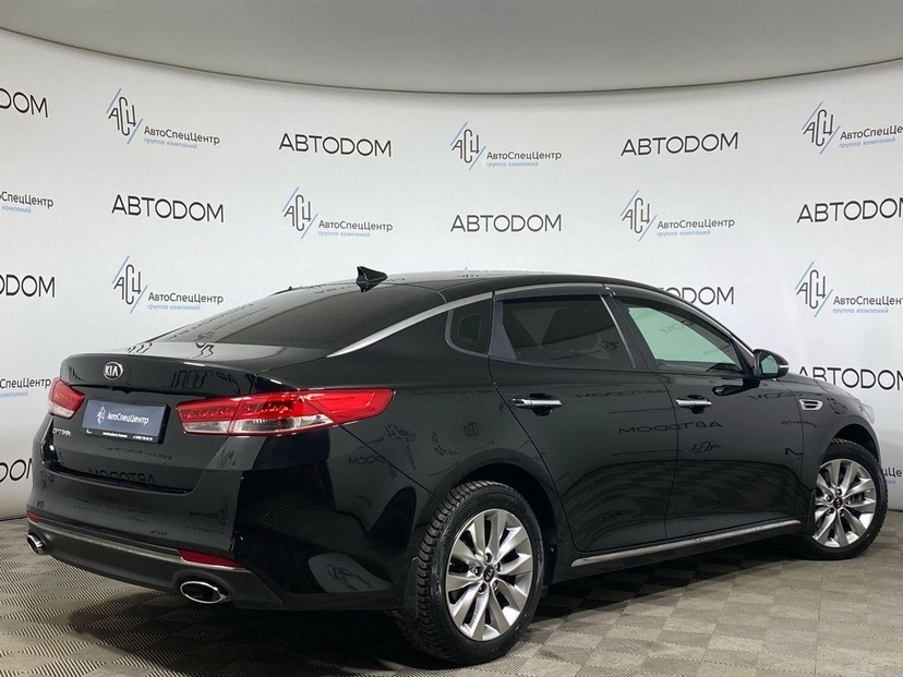 Автомобиль Kia Optima IV поколение 2.4 AT (188 л.с.) Prestige Чёрный 2017 с пробегом 142 086 км