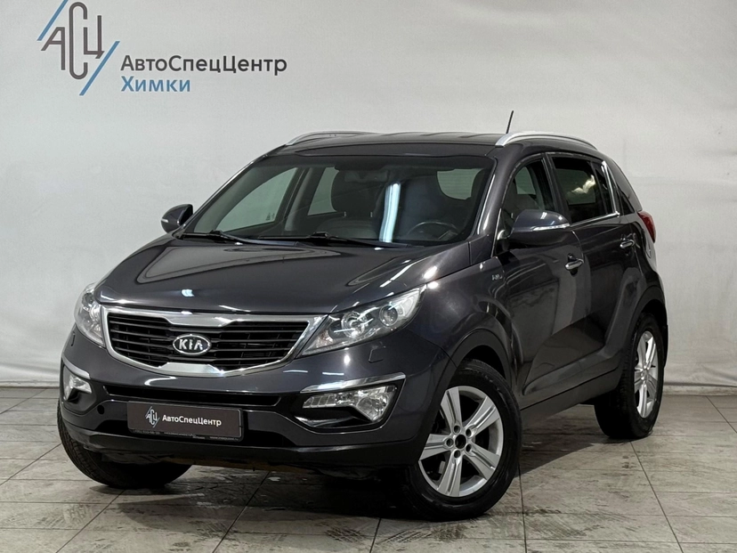 Автомобиль Kia Sportage III поколение 2.0 AT 4WD (150 л.с.) Prestige Серый 2012 с пробегом 130 000 км