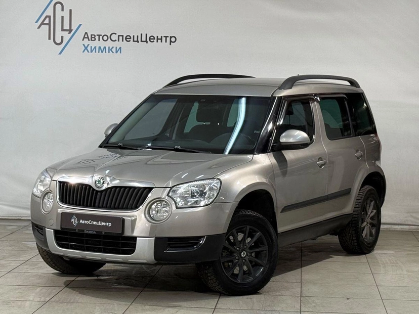 Автомобиль Skoda Yeti I поколение 2.0d AMT 4WD (140 л.с.) Base Бежевый 2013 с пробегом 216 000 км