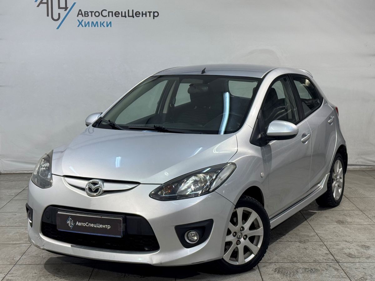 Автомобиль Mazda 2 II поколение (DE) 1.5 AT (103 л.с.) Base Серебристый 2008 с пробегом 98 000 км
