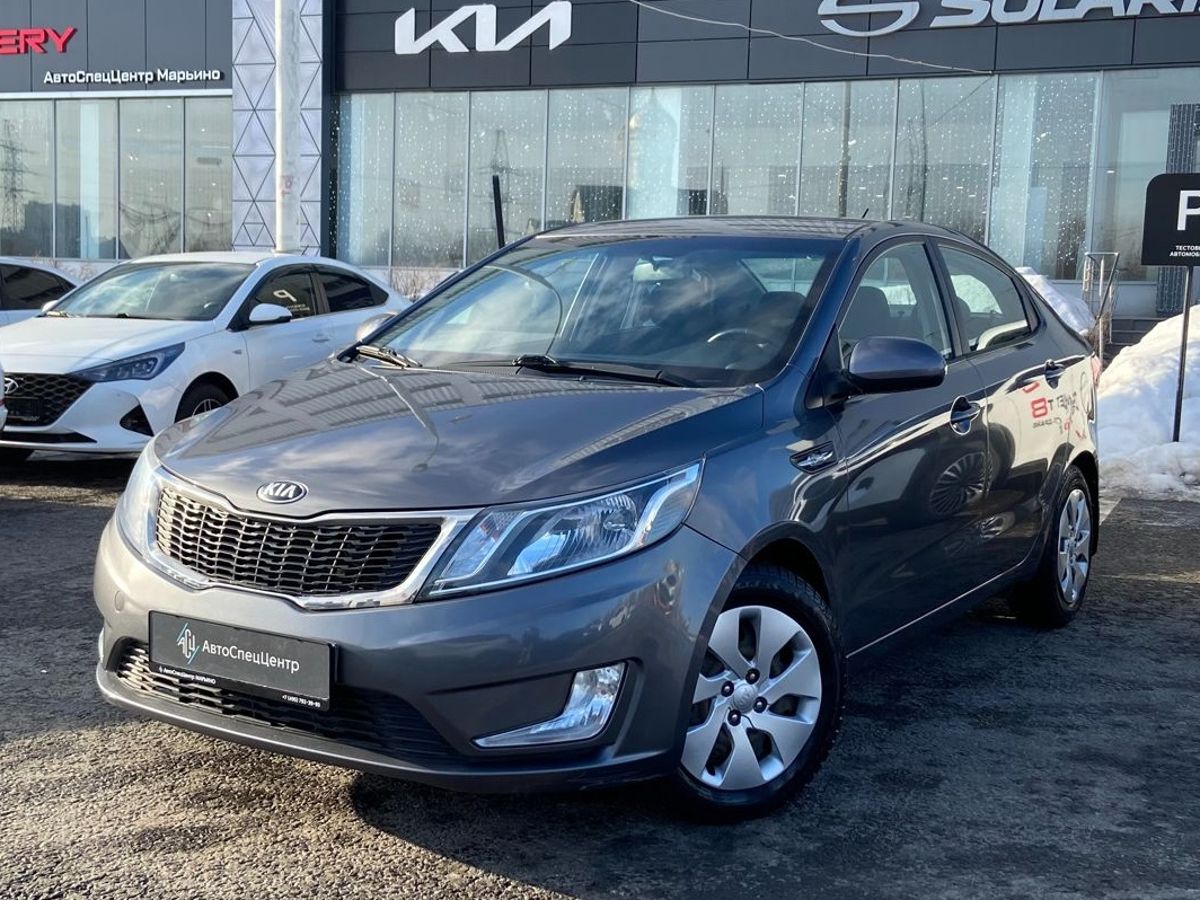 Автомобиль Kia Rio III поколение 1.6 6AT (123 л.с.) Base Серый 2015 с пробегом 60 000 км