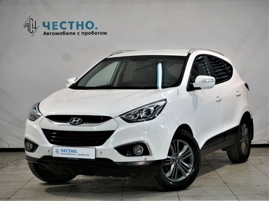 Автомобиль Hyundai ix35 I [рестайлинг] 2.0 AT 4WD (150 л.с.) Travel Белый 2013 с пробегом 132000 км