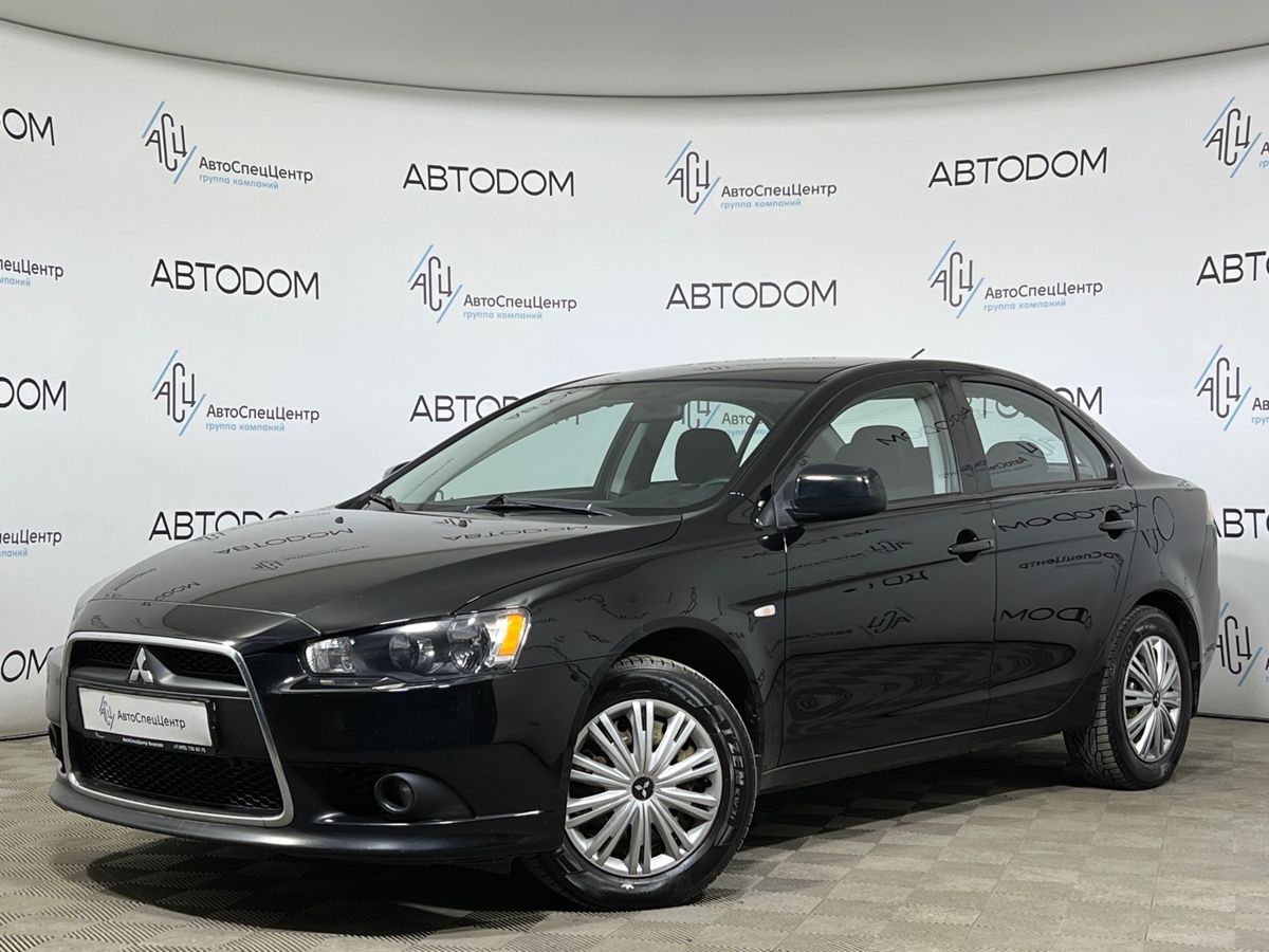Автомобиль Mitsubishi Lancer X [1-й рестайлинг] 1.6 MT (117 л.с.) Invite Чёрный 2014 с пробегом 169 501 км